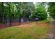 Community dog park features waste station, water, and secure fence at 4323 Bright Rd, Charlotte, NC 28214