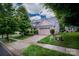 Charming two-story home featuring manicured landscaping and a spacious two-car garage at 4323 Bright Rd, Charlotte, NC 28214