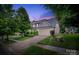 Charming two-story home featuring manicured landscaping and a spacious two-car garage at 4323 Bright Rd, Charlotte, NC 28214