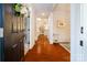 Elegant foyer with hardwood floors and open view to the living spaces at 4323 Bright Rd, Charlotte, NC 28214