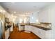 Spacious kitchen boasts stainless steel appliances, ample countertop space, and modern finishes at 4323 Bright Rd, Charlotte, NC 28214