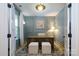 Stylish home office with paneled walls, a large desk, and comfortable seating at 4323 Bright Rd, Charlotte, NC 28214