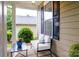 Cozy covered porch with comfortable seating, perfect for enjoying the outdoors at 4323 Bright Rd, Charlotte, NC 28214