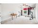 Bright bedroom featuring exercise equipment, a ceiling fan, and a view of a window at 444 Battery Cir, Clover, SC 29710