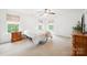 Bright bedroom with natural light, neutral colors, and classic furnishings at 444 Battery Cir, Clover, SC 29710