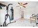 Large carpeted bedroom featuring exercise equipment, a ceiling fan, and neutral walls at 444 Battery Cir, Clover, SC 29710