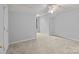 Neutral bedroom features carpet flooring and ceiling fan at 4557 Panther Pl, Charlotte, NC 28269