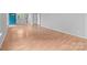 Spacious living room with hardwood floors, neutral walls, and ample natural light at 4557 Panther Pl, Charlotte, NC 28269