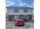 Two-story townhouse featuring a neutral siding, black shutters, and private entrances at 484 Willow Spring Ln # B, Rock Hill, SC 29730