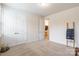 Bedroom showcasing natural light, closet doors, and neutral palette at 5130 Watersail Way, Clover, SC 29710