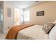Comfortable bedroom featuring a plush bed, natural light, and a view into the bathroom at 5130 Watersail Way, Clover, SC 29710