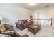 Spacious living room with neutral carpet and comfortable seating, perfect for relaxing or entertaining guests at 5130 Watersail Way, Clover, SC 29710