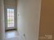 Entryway showcasing a glass paneled door allowing natural light to flood the area at 5476 Ives Nw St, Concord, NC 28027