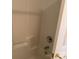 A close-up of the shower with built-in shelving at 5476 Ives Nw St, Concord, NC 28027