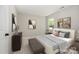 Relaxing bedroom with neutral tones, soft lighting, and coordinated artwork, creating a peaceful retreat at 6033 Edinmeadow Ln, Charlotte, NC 28269