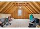Spacious unfinished attic with plywood walls, and open rafters at 620 River Birch Dr, Salisbury, NC 28146