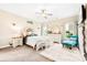 Cozy bedroom with neutral tones, a queen bed, ceiling fan and natural light from multiple windows at 620 River Birch Dr, Salisbury, NC 28146