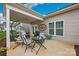 Home's covered patio featuring outdoor furniture and home exterior at 620 River Birch Dr, Salisbury, NC 28146