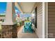 Cozy front porch with inviting blue chairs at 620 River Birch Dr, Salisbury, NC 28146
