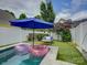 Relaxing backyard retreat with a pool, patio, and comfortable outdoor furniture at 628 Bracket St, Fort Mill, SC 29708