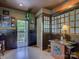 Entertaining finished basement with a wet bar, custom woodwork, and access to the exterior at 628 Bracket St, Fort Mill, SC 29708
