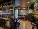 Entertaining basement bar area with granite countertop, wet bar, and custom woodwork at 628 Bracket St, Fort Mill, SC 29708