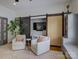 Bonus room boasts hardwood floors, neutral paint and french doors at 628 Bracket St, Fort Mill, SC 29708