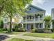 Charming two-story home with double porches and professional landscaping in a sidewalk neighborhood at 628 Bracket St, Fort Mill, SC 29708