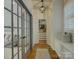Hallway features a bench, decorative lighting, hardwood floors and neutral paint at 628 Bracket St, Fort Mill, SC 29708