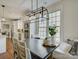 Bright and airy kitchen with modern lighting fixtures and an eat-in dining area at 628 Bracket St, Fort Mill, SC 29708