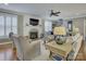 Bright living room features hardwood floors, fireplace and an open floor plan at 628 Bracket St, Fort Mill, SC 29708