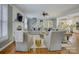 Bright living room features hardwood floors, fireplace, built-in shelving, and an open floor plan at 628 Bracket St, Fort Mill, SC 29708