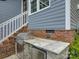 Outdoor grill station with stone countertop and stainless steel appliances at 628 Bracket St, Fort Mill, SC 29708