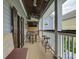 Relaxing outdoor seating area featuring a ceiling fan, mounted television, and views of the neighborhood at 628 Bracket St, Fort Mill, SC 29708
