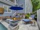 Cozy outdoor patio featuring a firepit, seating area, and built-in grill at 628 Bracket St, Fort Mill, SC 29708