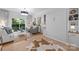 Inviting living space features a murphy bed, stylish furnishings, and a seamless connection to the outdoors, perfect for relaxation at 630 Calvert St # 111, Charlotte, NC 28208