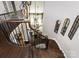 Staircase featuring dark wood railing and mirrors hanging on the walls at 6510 Honeymeade Cir, Charlotte, NC 28277