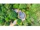 Stunning aerial view of home featuring lush landscaping and a beautiful outdoor living area with a fire pit at 6639 Camp Creek Rd, Lancaster, SC 29720