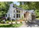 Lovely painted-brick home with dark-trimmed windows, lush landscaping, and inviting curb appeal at 6639 Camp Creek Rd, Lancaster, SC 29720
