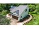 Aerial view of a beautifully landscaped home featuring a brown garage door, with a manicured lawn at 6639 Camp Creek Rd, Lancaster, SC 29720