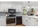 Updated kitchen with a view into the living room, perfect for entertaining at 6639 Camp Creek Rd, Lancaster, SC 29720