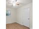 An empty bedroom with light walls, light wood floors, and one window at 818 Stowe Ln, Gastonia, NC 28056