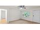 Bright bedroom featuring a large window, wood floors, and ample closet space at 818 Stowe Ln, Gastonia, NC 28056