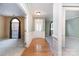 Welcoming foyer featuring hardwood floors, and decorative molding at 9419 Olivia Ln, Charlotte, NC 28277