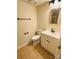 Clean bathroom with white vanity, new toilet, and tile flooring at 9541 Shannon Green Dr # C, Charlotte, NC 28213