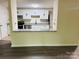 Bright kitchen with modern appliances, granite countertops, and ample cabinet space at 9541 Shannon Green Dr # C, Charlotte, NC 28213