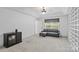 Bedroom featuring carpet, an entertainment center, and a gray sofa at 1009 Jerry Ln, Matthews, NC 28105