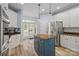 Inviting kitchen featuring stainless steel appliances, granite counters, and a functional island at 1009 Jerry Ln, Matthews, NC 28105