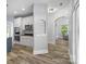 Bright kitchen featuring white cabinets, stainless steel appliances, and a cozy breakfast nook at 1009 Jerry Ln, Matthews, NC 28105