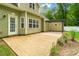 Spacious backyard patio, with a covered carport, offering ample room for outdoor activities at 1009 Jerry Ln, Matthews, NC 28105